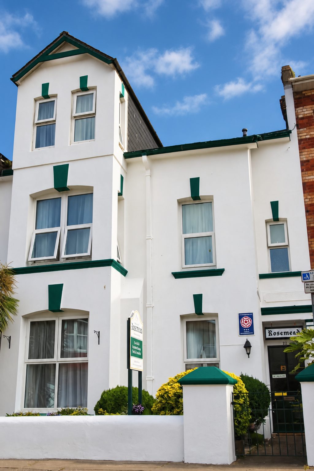 Rosemead Guest House — white Victorian house with green trim, Paignton